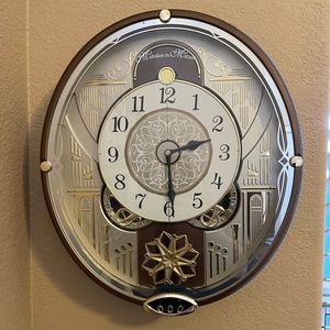 Seiko Melodies in Motion wall clock.  Sings and almost dances.